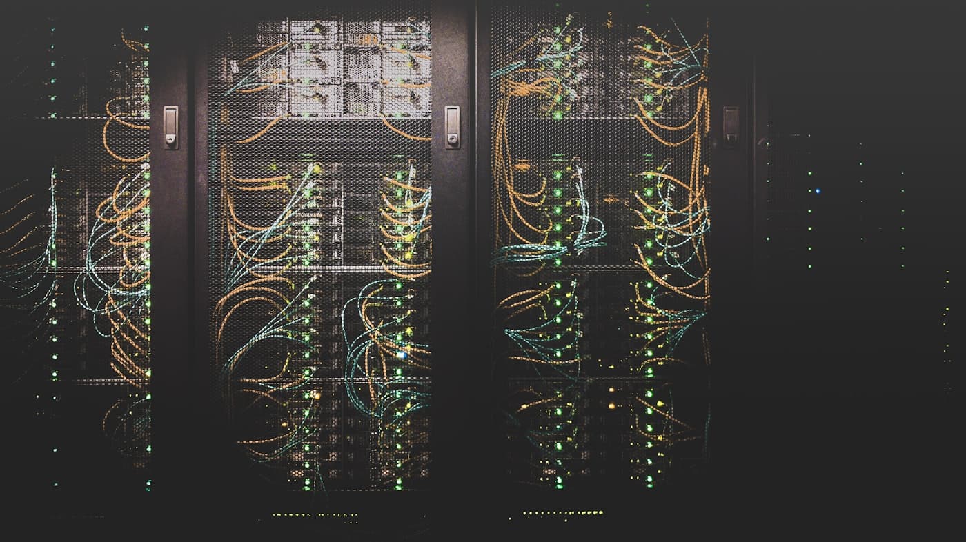 Rows of servers in a data center, representing LoneSock's own Tier-3 facility